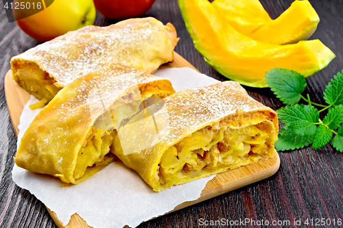 Image of Strudel pumpkin and apple on board