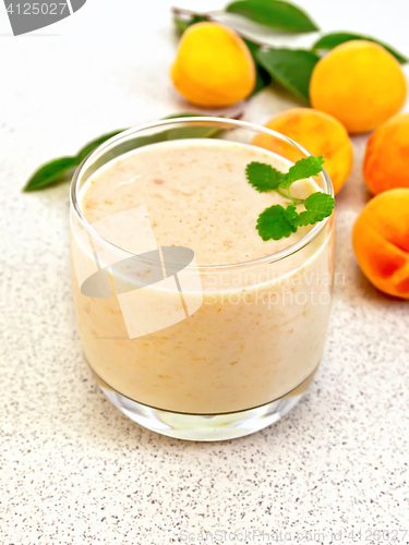 Image of Milkshake apricot on granite table