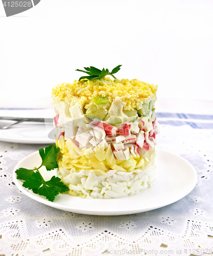 Image of Salad of crab sticks on napkin