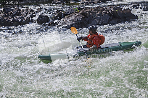 Image of Kayaker in whitewater