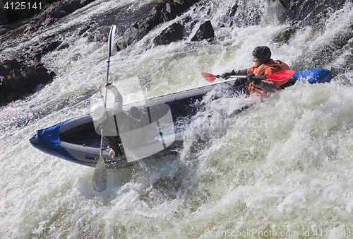 Image of Kayakers in whitewater