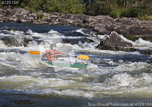 Image of Kayaker in whitewater