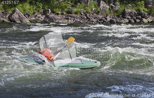 Image of Kayaker in whitewater