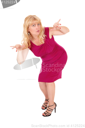 Image of Woman standing gesturing with hands.