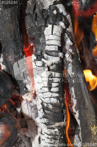 Image of red coals in the fire