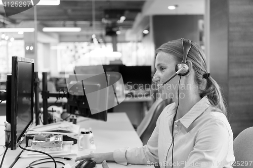 Image of female support phone operator