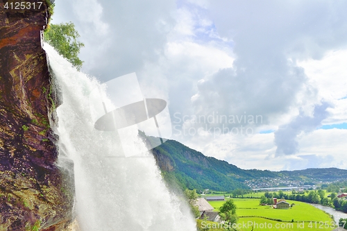 Image of Steinsdalsfossen waterfall closeup and Norwegian countryside