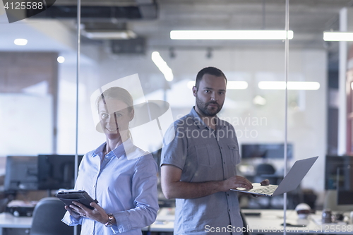 Image of business couple at office