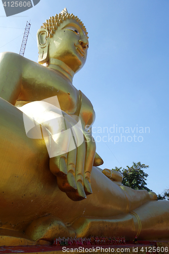 Image of Golden Buddha statue of Big Buddha over blue sky