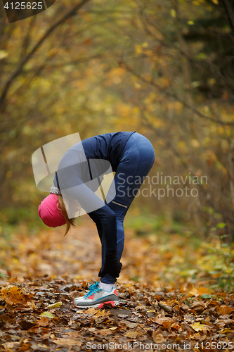 Image of Young girl engaged in sports