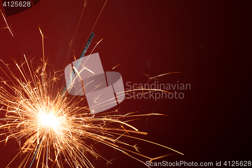 Image of Blank background with christmas sparkler