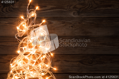 Image of Glowing garland on empty background