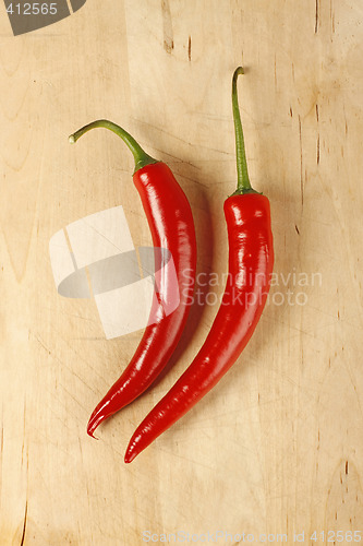 Image of Two red peppers