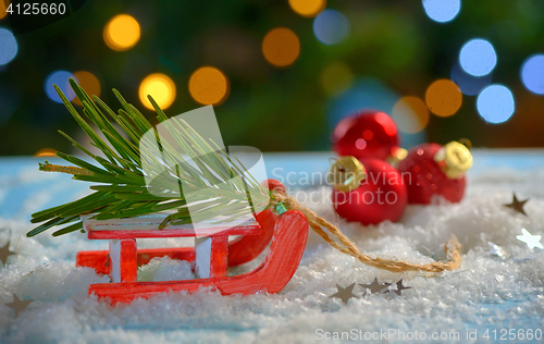 Image of Christmas tree and sleigh decoration