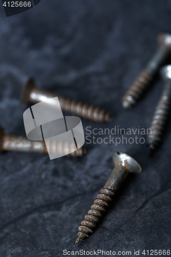 Image of Group of rusty screws