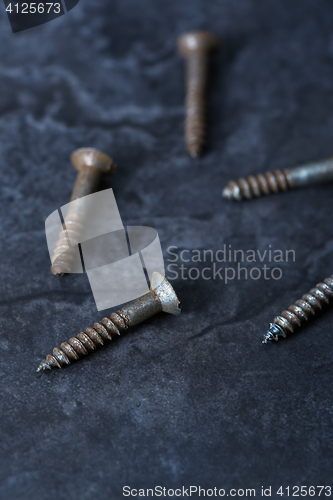 Image of Group of rusty screws