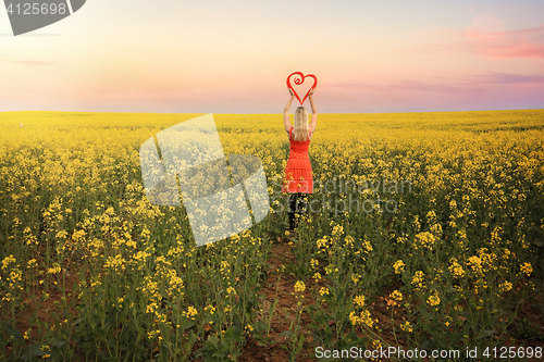 Image of  Woman in Canola Fields in Young Country NSW