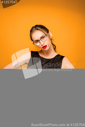 Image of The young woman\'s portrait with wary emotions