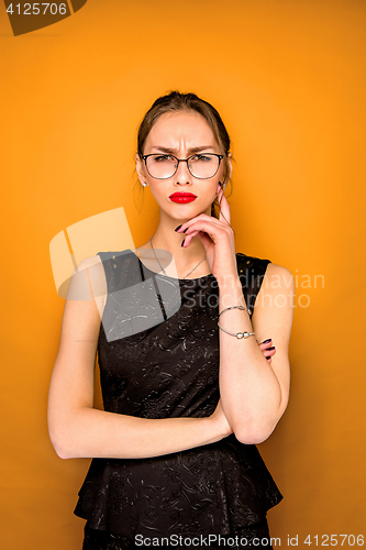 Image of The young woman\'s portrait with wary emotions