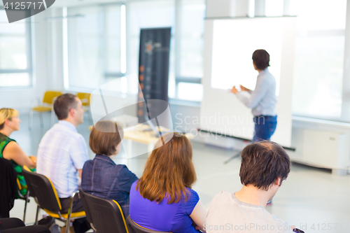 Image of Speaker at workshop and presentation.