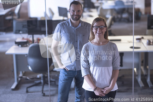 Image of business couple at office