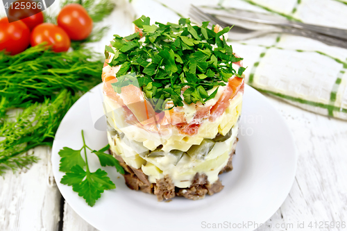 Image of Salad with beef and tomato on table