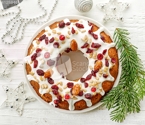 Image of Christmas cake on white wooden table