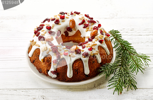 Image of Christmas cake on white wooden table