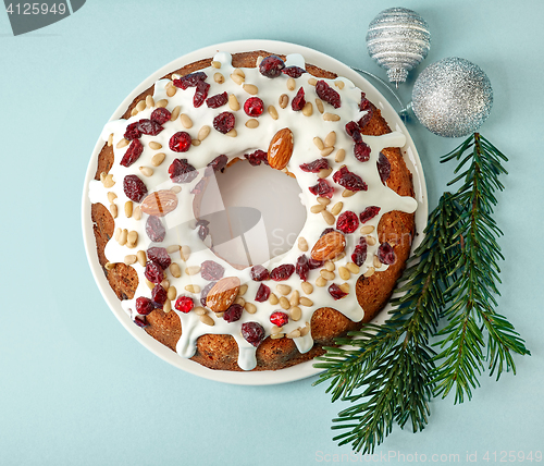 Image of Christmas cake on blue background