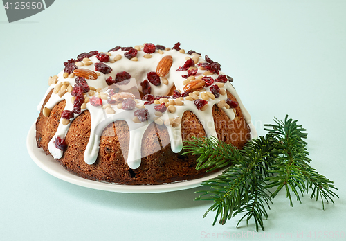 Image of Christmas cake on blue background