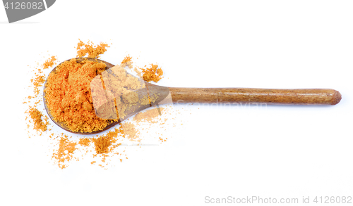 Image of Curry Powder in Wooden Spoon