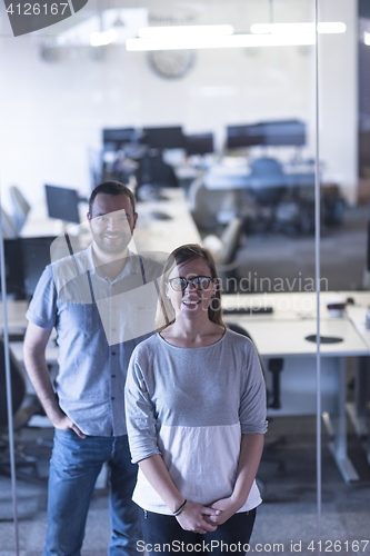 Image of business couple at office