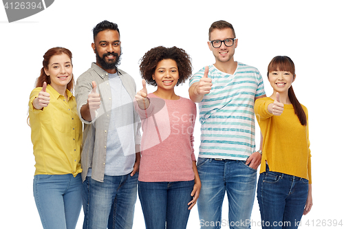 Image of international group of people showing thumbs up