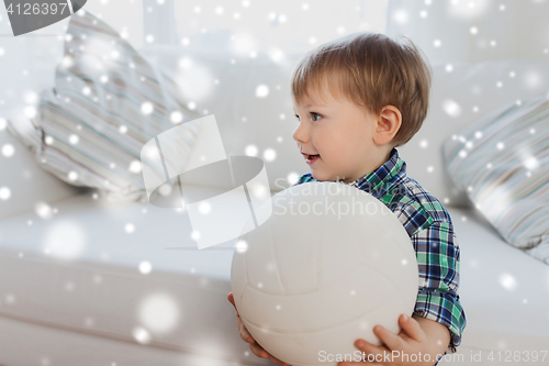 Image of happy little baby boy with ball at home