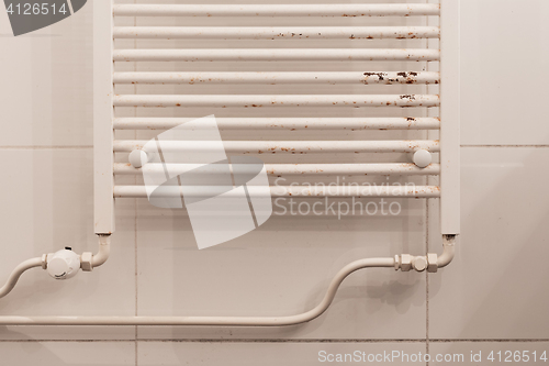 Image of Rusty household cast iron radiator