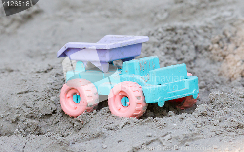 Image of Children\'s machine in the sand