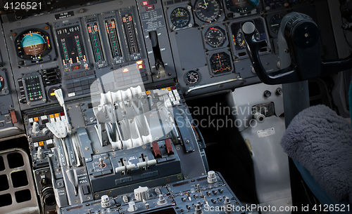 Image of Center console and throttles in airplane