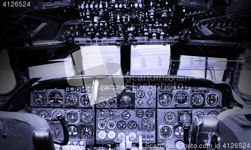 Image of Center console and throttles in airplane