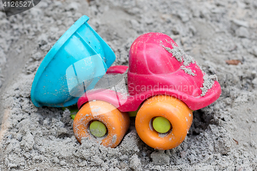 Image of Children\'s machine in the sand