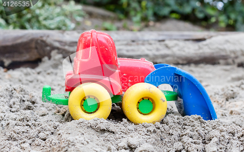 Image of Children\'s machine in the sand