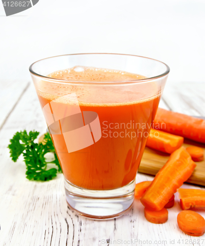 Image of Juice carrot with vegetables and parsley on board