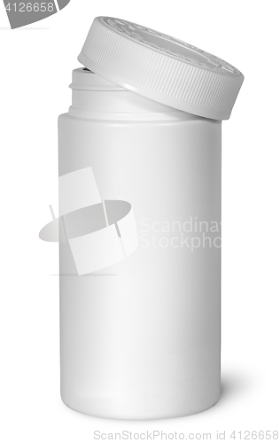 Image of White plastic bottle for vitamins with lid removed