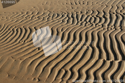 Image of  striped patterns in the sand