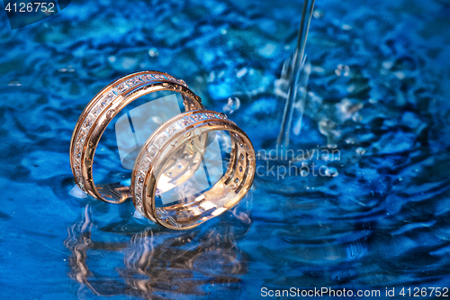 Image of Golden Rings In The Water