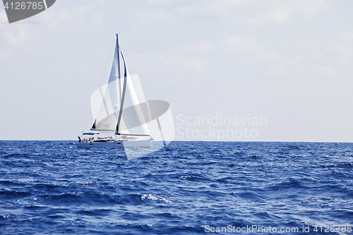 Image of Yacht with white sails