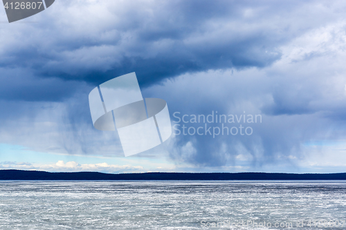 Image of Wild nature cloudy sky and lake