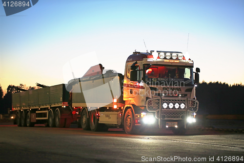 Image of Customized Scania Truck on Truck Stop at Dusktime