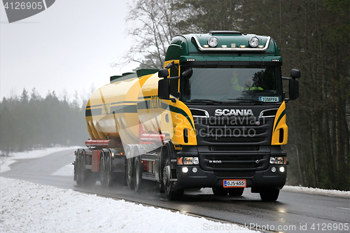 Image of Scania R500 Tank Truck Trucking in Foggy Winter Weather