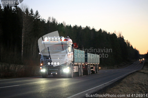 Image of Customized Scania Lights on Dark Rural Road 