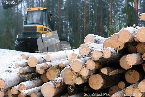 Image of PONSSE Elk Forest Forwarder and Stack of Logs